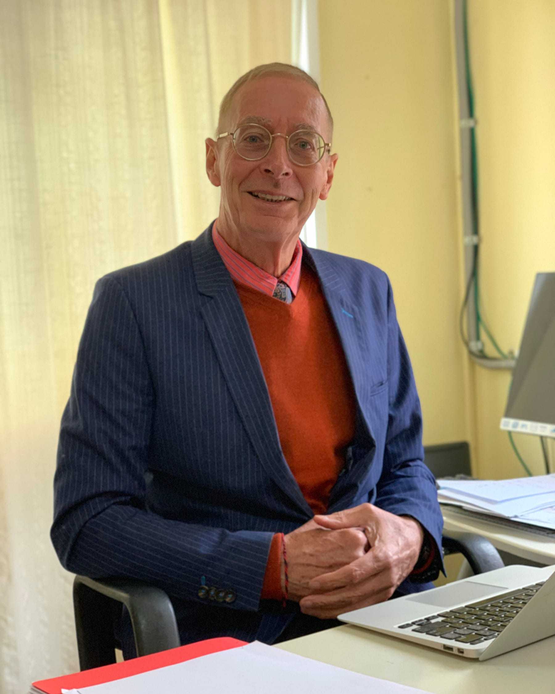 Paddy Kelly, Director of Education, at his desk.